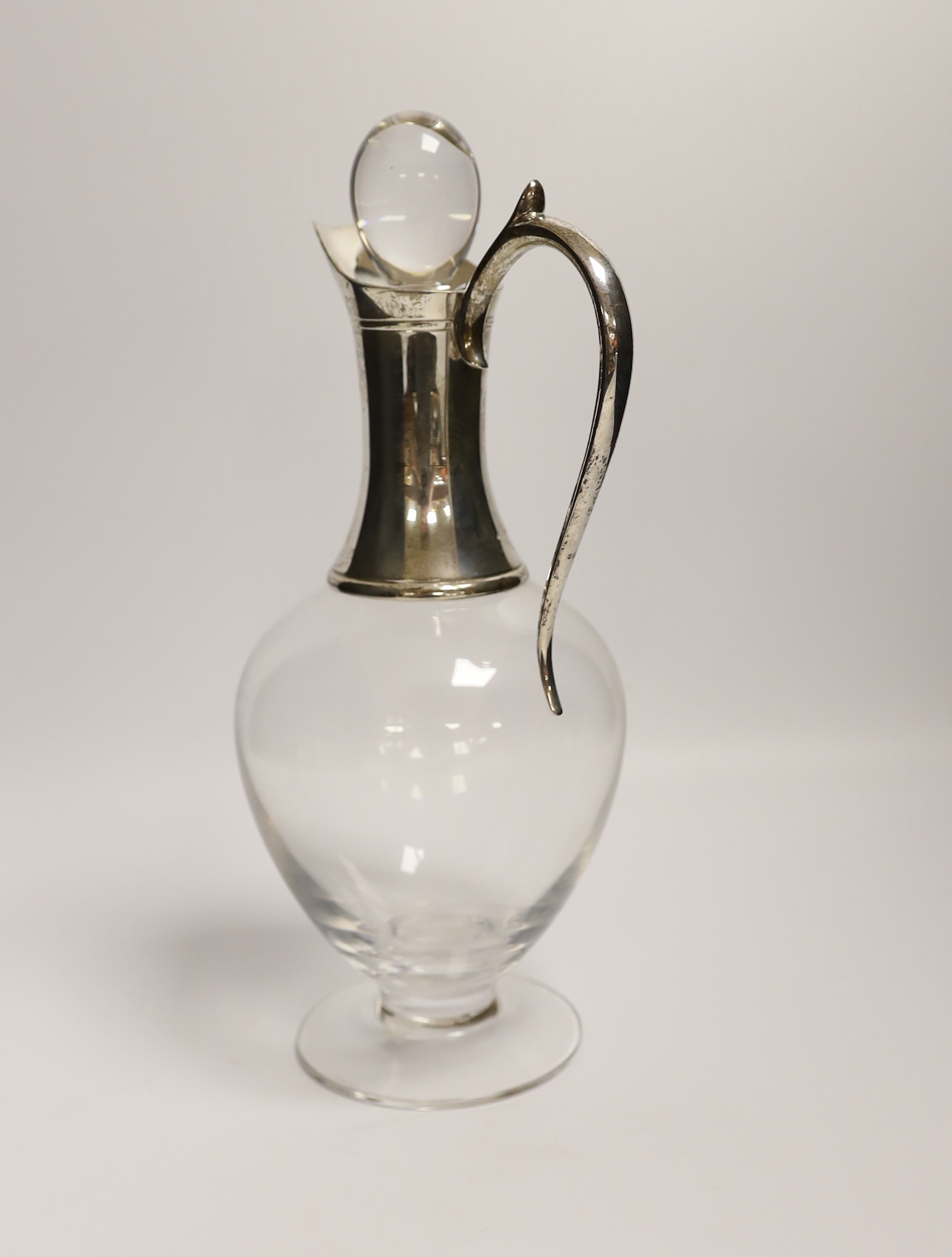 An Elizabeth II silver mounted glass claret jug and stopper, by J.A. Campbell, 2004, height 28.2 excl. stopper, in original fitted box.